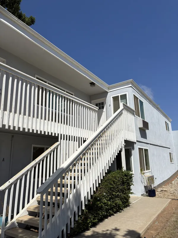 Multi-family apartment building where exterior electrical work was done