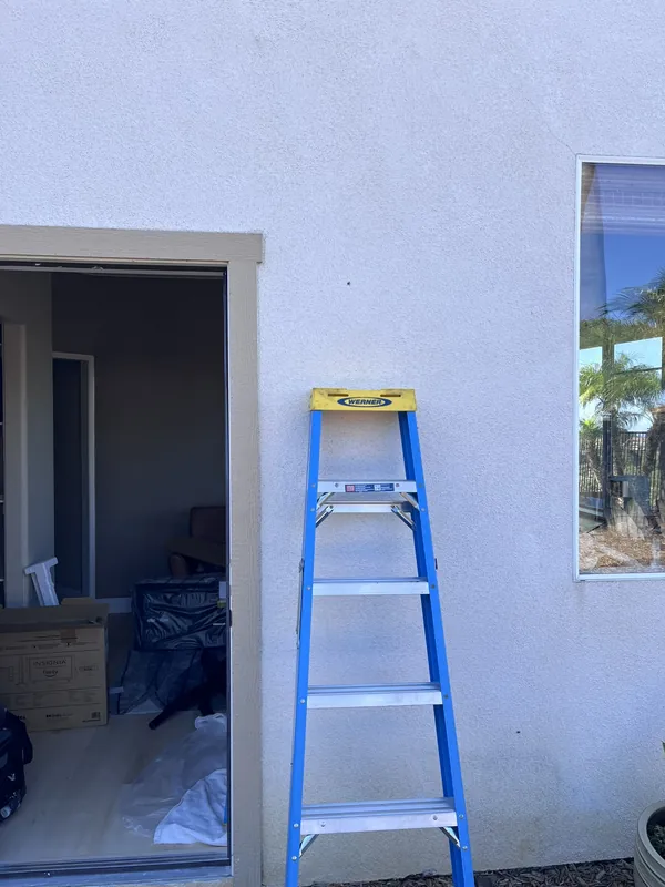 Exterior wall before a new light fixture was installed