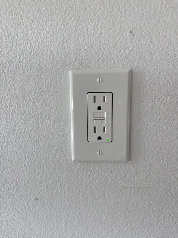 GFCI outlet installed in a wall