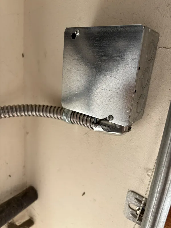 Junction box secured and connections remade