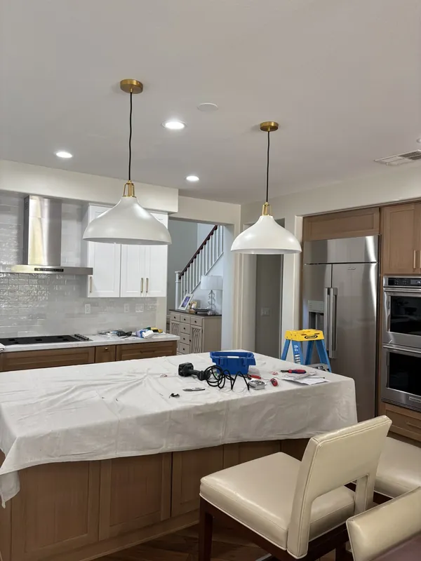 Pendant lights installed over a kitchen island
