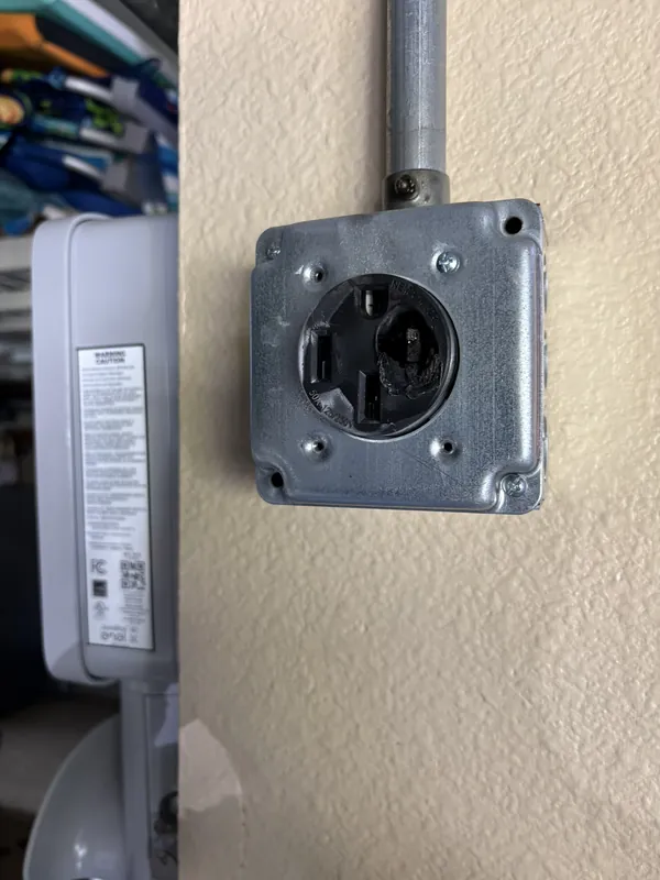 NEMA 14-50 240V outlet installed for EV charging