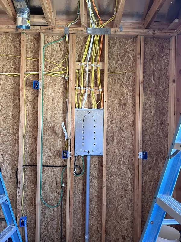 New construction electrical rough-in with panel and circuits