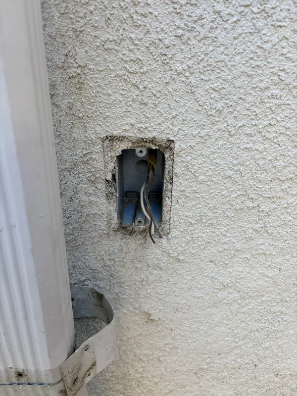 Exterior outlet box before replacement