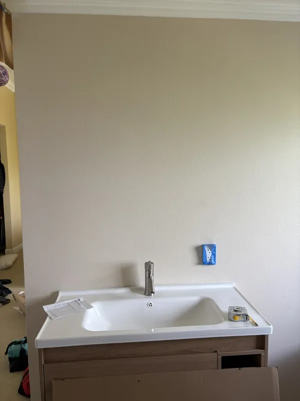 Bathroom vanity before mirror lighting was wired